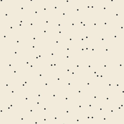 Pattern of black dots on a beige background