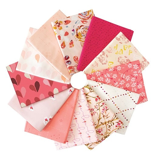 Set of fabric swatches with floral and heart patterns arranged in a circular fashion.
