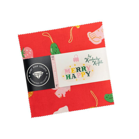 Red fabric square with cartoon designs and a label on a white background