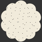 A round cream-colored fabric swatch with scalloped edges and small black polka dots, shown on a dark gray background.