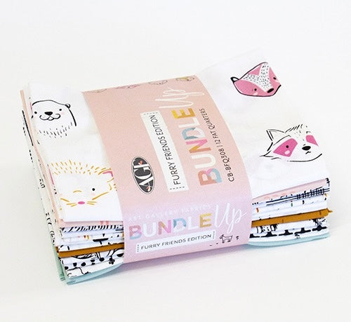 Stack of fabric bundles with 'Bundle Up' and 'Furry Friends Edition' text on a white background