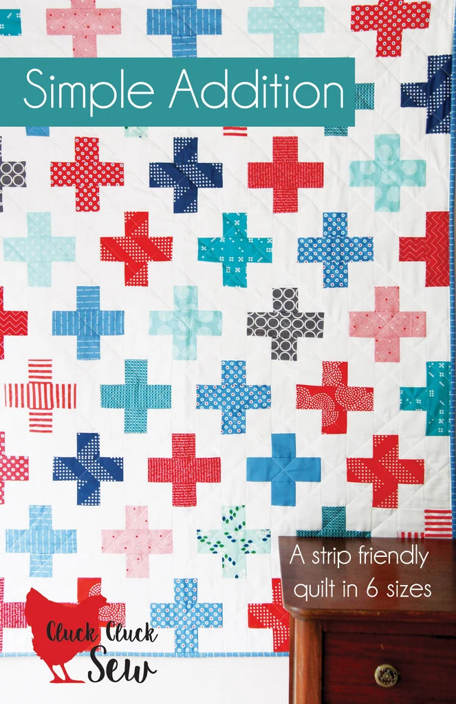 Quilt pattern with red, blue, and pink plus signs on a white background, featuring the brand 'Chook Chook Sew'.