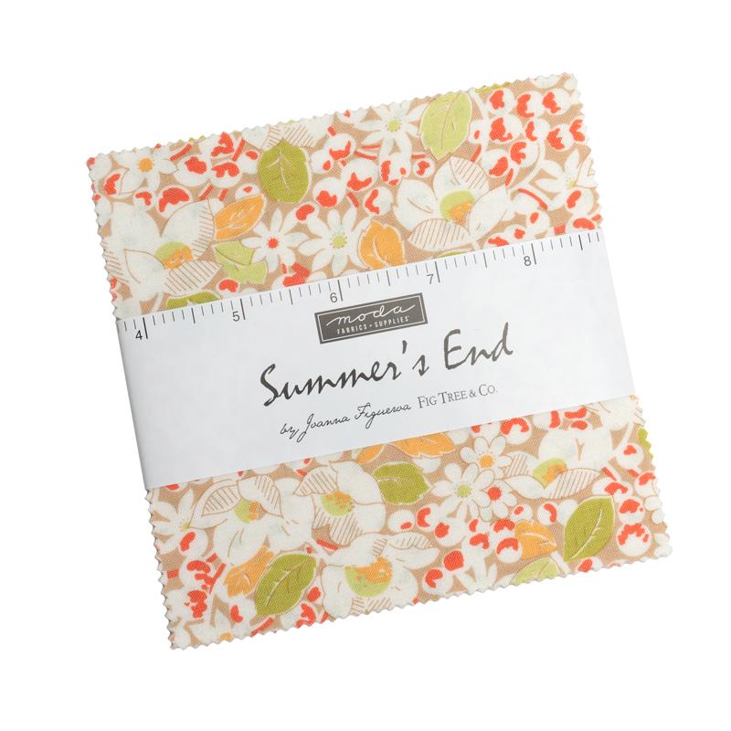 Floral fabric square with a ruler and 'Moda' label on a white background