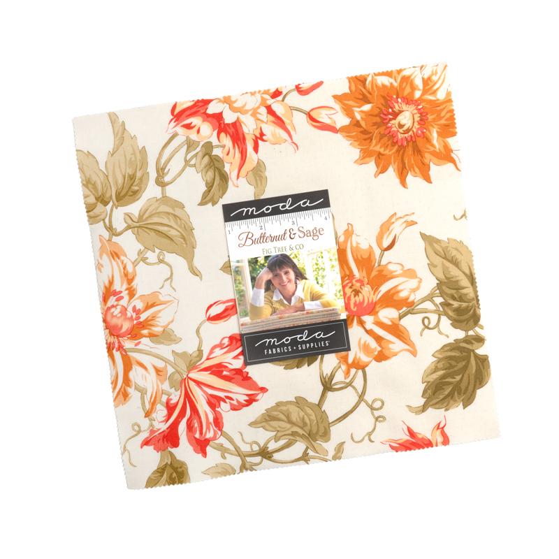A folded fabric bundle from Moda Fabrics Complete, featuring a floral pattern with orange and red flowers, green leaves, and brown vines on a cream background, with a paper label in the center.