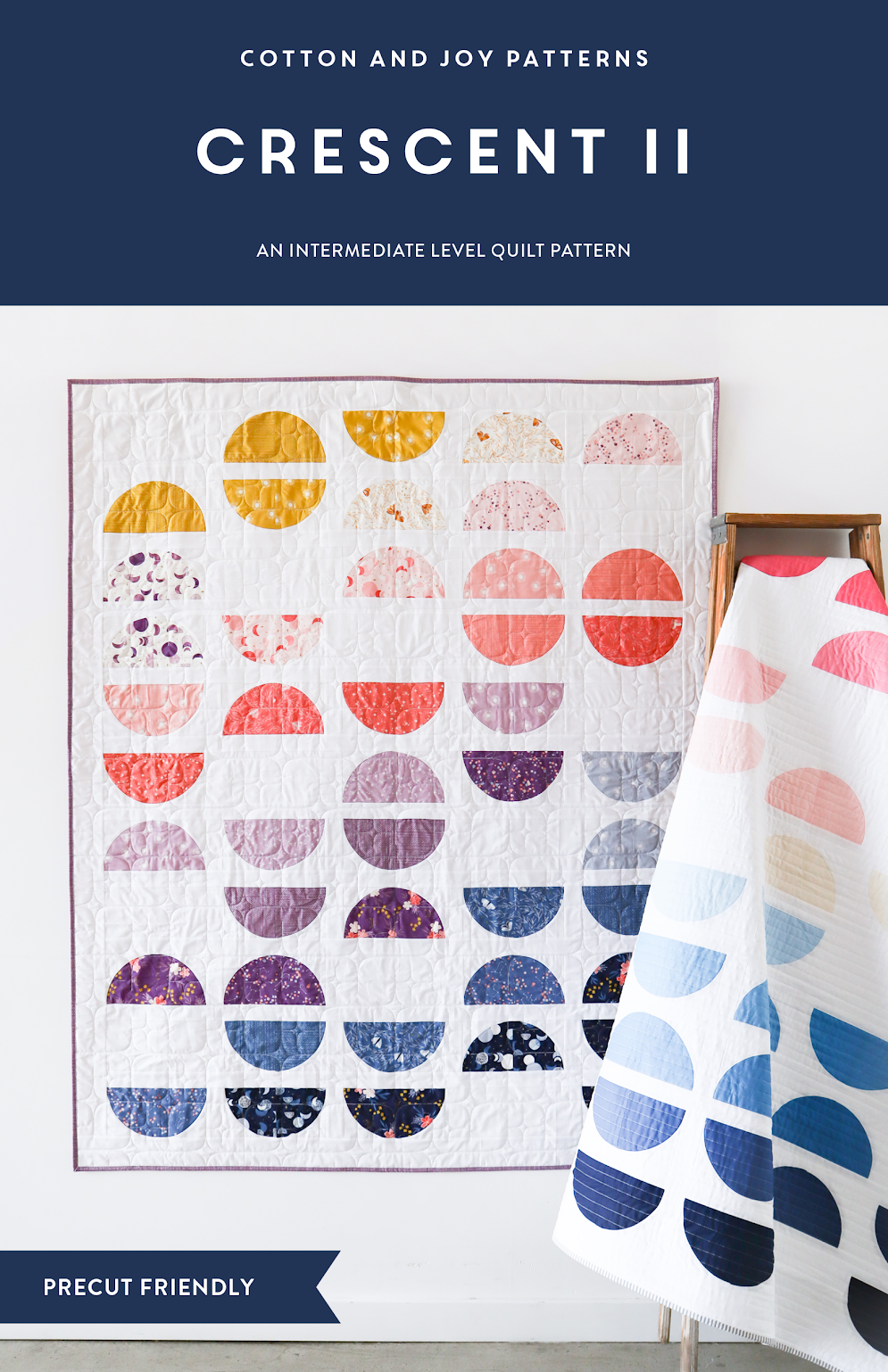 Crescent II quilt pattern by Cotton and Joy with a colorful quilt on a white background.