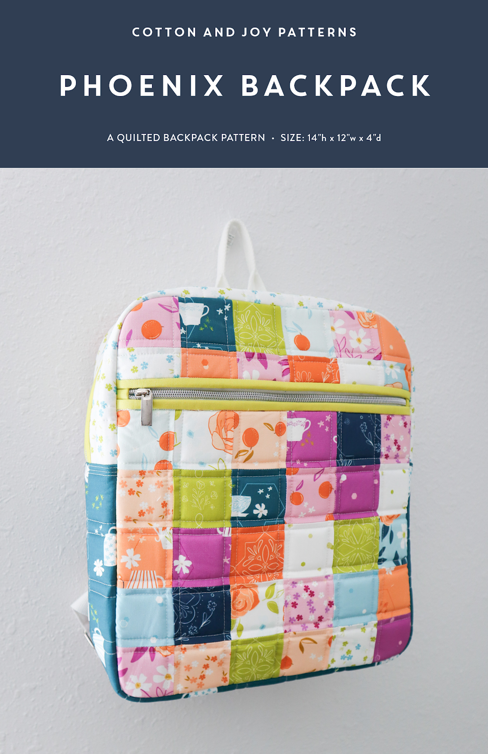 Colorful quilted backpack with a patchwork design on a gray background