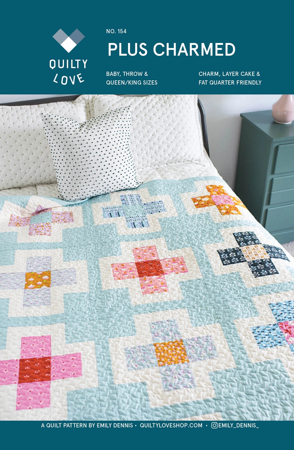 Quilt pattern book cover with a colorful quilt on a bed